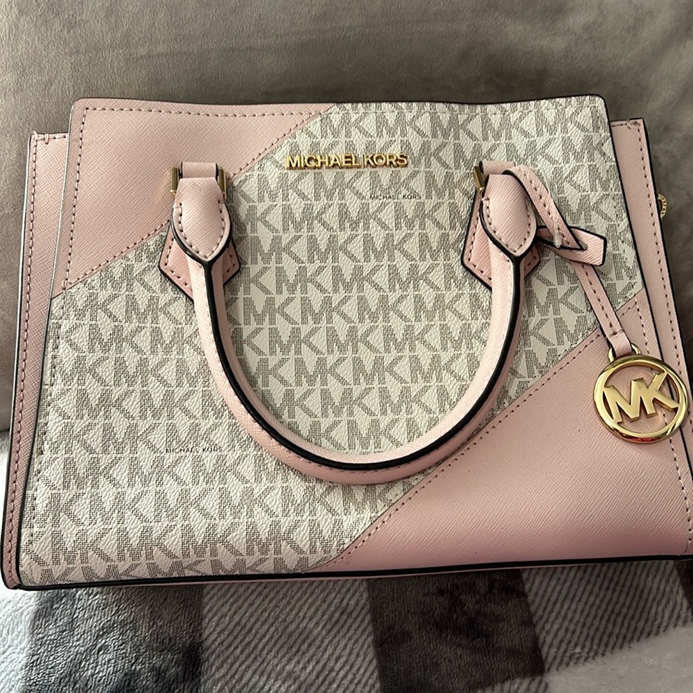 Pink and white MK crossbody purse